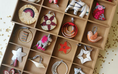 A unique collection of 24 holiday ornaments crafted by refugees in 15 countries around the world